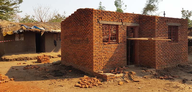 Building social housing Malawi with corporate volunteers