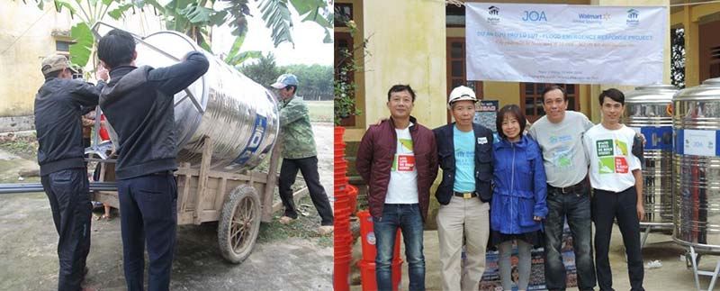 charity installing safe water tanks in vietnam floods