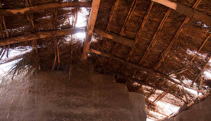 thatched roof extreme poverty in Malawi