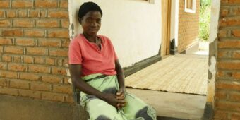 Housing in malawi, beneficiary woman