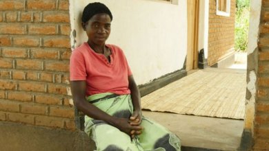 Housing in malawi, beneficiary woman