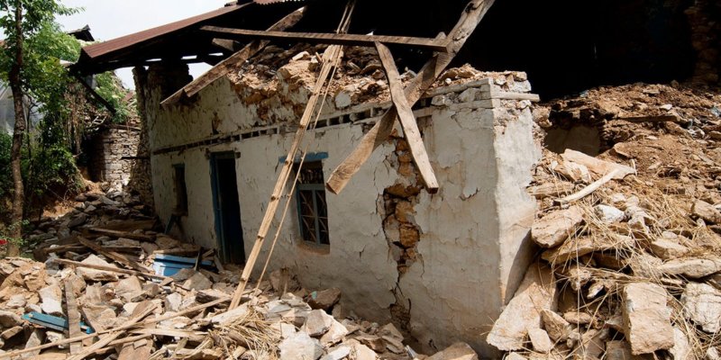 a home destroyed by the earthquake in Nepal