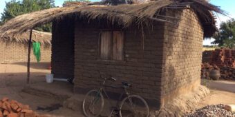 mud house in malawi: extreme poverty housing