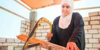 jordan volunteer building with a saw