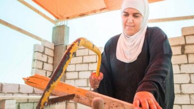 jordan volunteer building with a saw