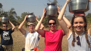 Volunteers water carry in India