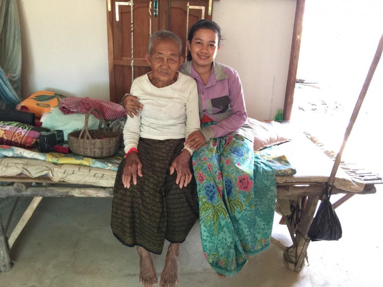 Ktut Et and her grandaughter Lina at home in Cambodia