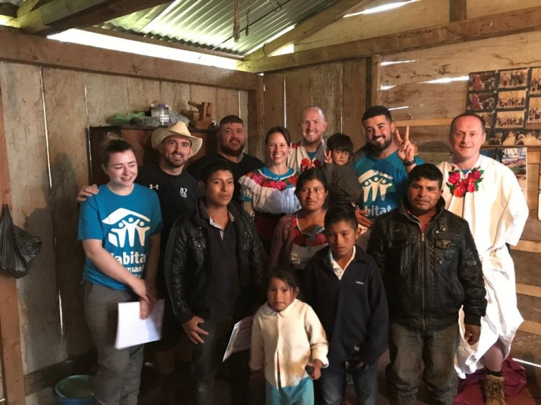 Pedro Pablo's family with the volunteers from Great Britain.