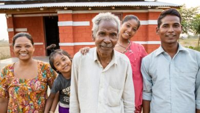 family stand outside their home (image for vacancies page)