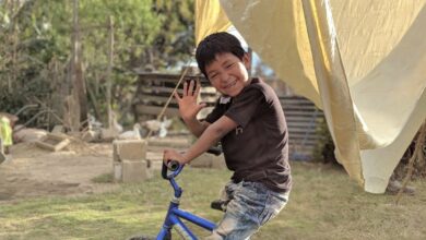 Guatemala boy on bike