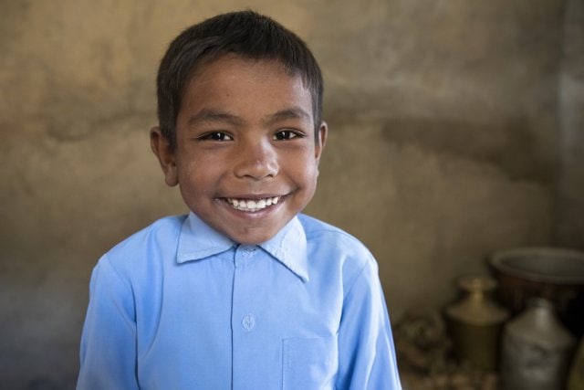 boy smiling after the Gorkha Earthquake in Nepal