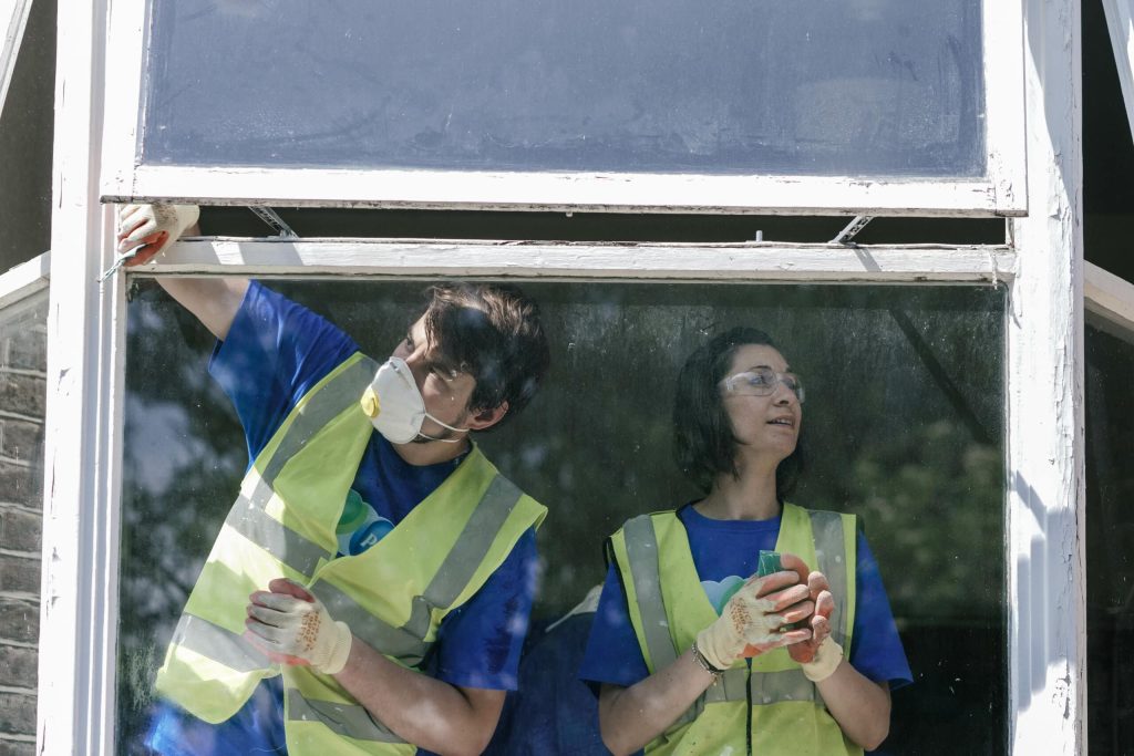 volunteers work together in Great Britain to support charity work with Habitat for Humanity Great Britain