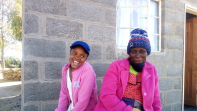 Lesotho grandmother and grand daughter. Board image