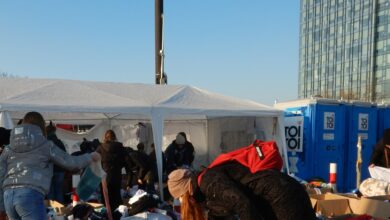 refugees at the train/bus station in Warsaw