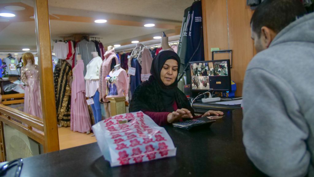 buy in bulk - cost of living crisis - woman shopping