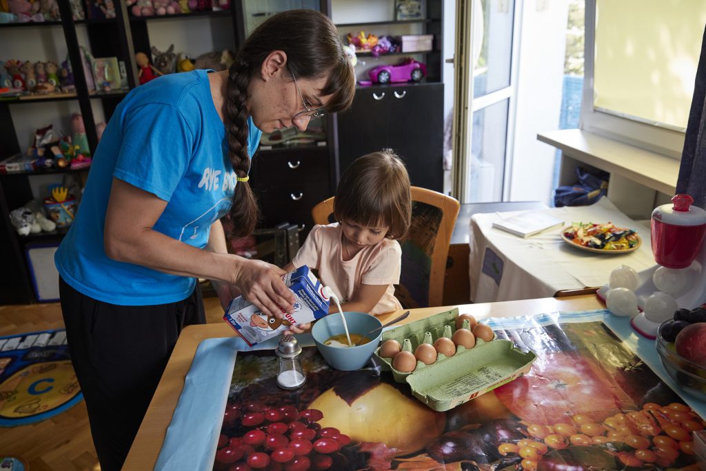 Yana and family feed habitat staff visiting them - ukraine crisis