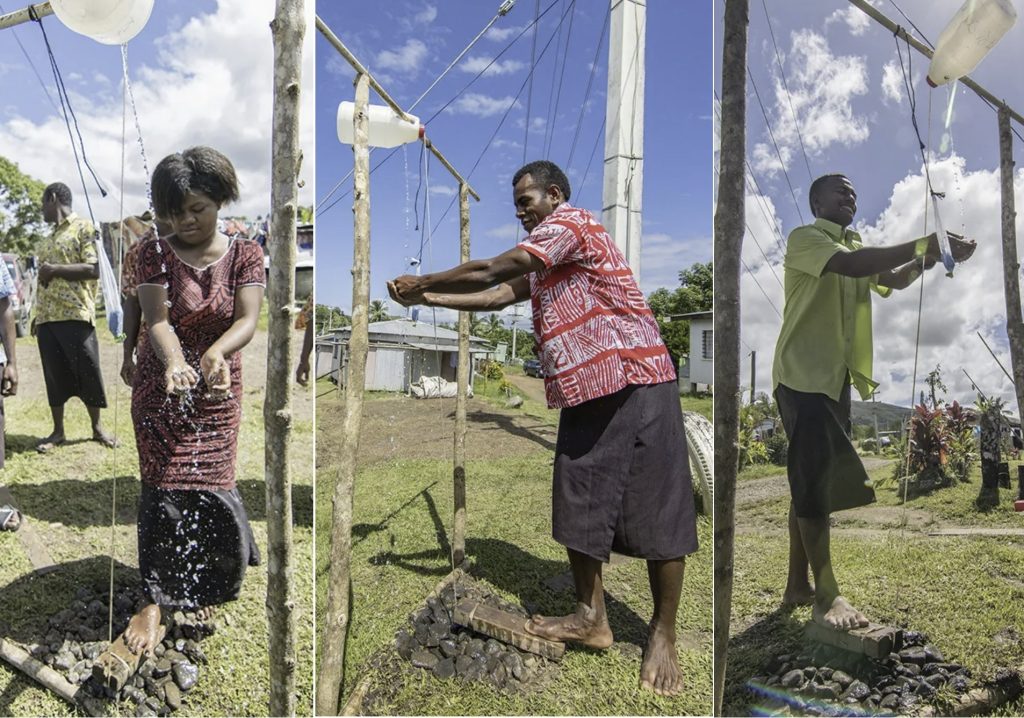 people using tippy taps in fiji