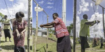 people using tippy taps in fiji