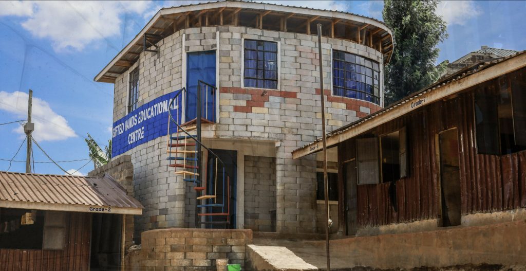 home equals - building with twist blocks in kibera