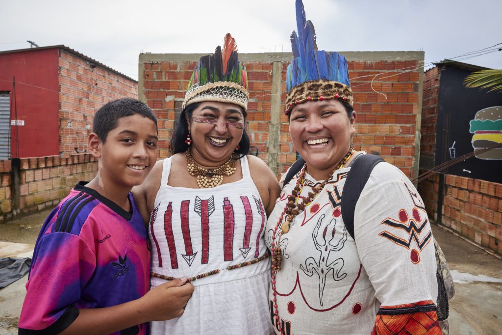 indigenous family smiling together in Brazil