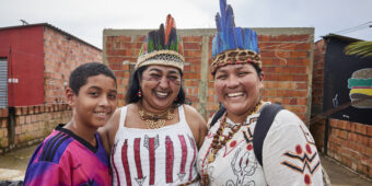 indigenous family smiling together in Brazil