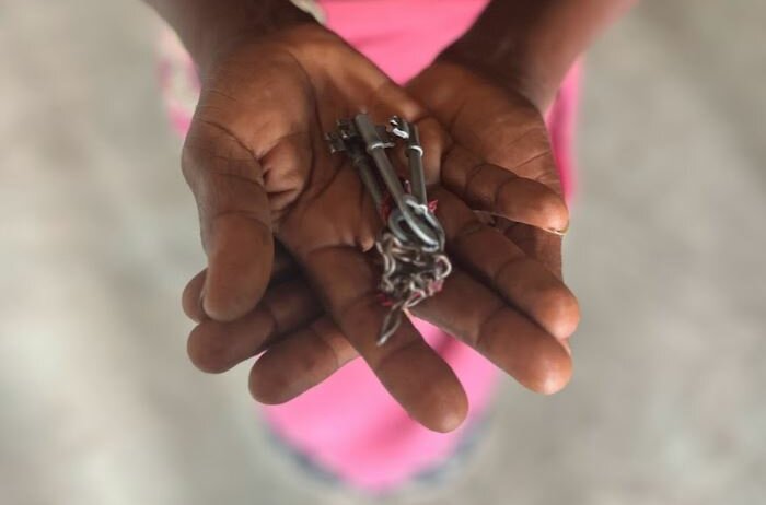 Person holding keys - Spring Appeal 2024