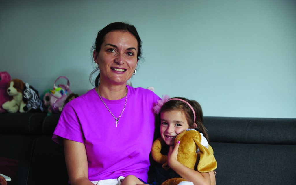 Iryna and her daughter Kira from Ukraine, smiling at the camera