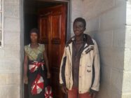 Austin and Ginny closeup outside their new Habitat for Humanity home