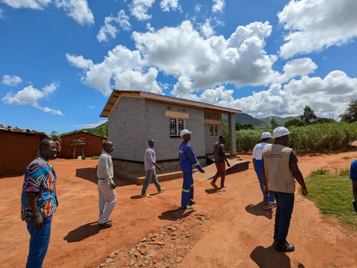 A cement block house built with Habitat for Humanity