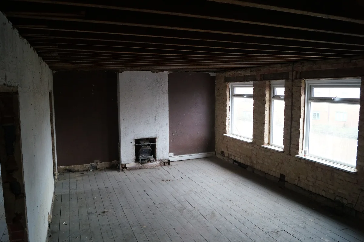 An empty, unfurnished room interior