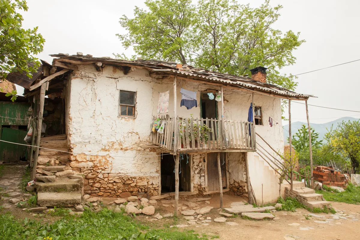 A modest rural house with plastered walls